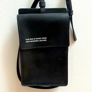 Phone holder/credit card bag from Pangaia. Brand new. 100% vegan leather